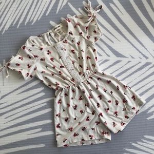 Girl’s floral romper (size 5) - Shosho